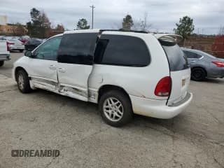 ✅ 2000 Dodge Caravan SE • VIN: 2B4GP44G9YR687048 • Lot: 85239584. Listed on Copart with Not provided. Free auction sales archive from the USA and detailed vehicle history report at DreamBid. Image 2.