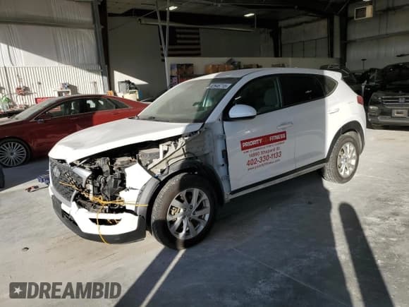 ✅ 2021 Hyundai Tucson SE • VIN: KM8J2CA47MU296355 • Lot: 82646715. Listed on Copart with 113,557 mi. Free auction sales archive from the USA and detailed vehicle history report at DreamBid. Image 1.