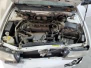 ✅ 1997 Nissan Altima XE • VIN: 1N4BU31D2VC153538 • Lot: 92502105. Listed on Copart with 146,779 mi. Free auction sales archive from the USA and detailed vehicle history report at DreamBid. Image 11.