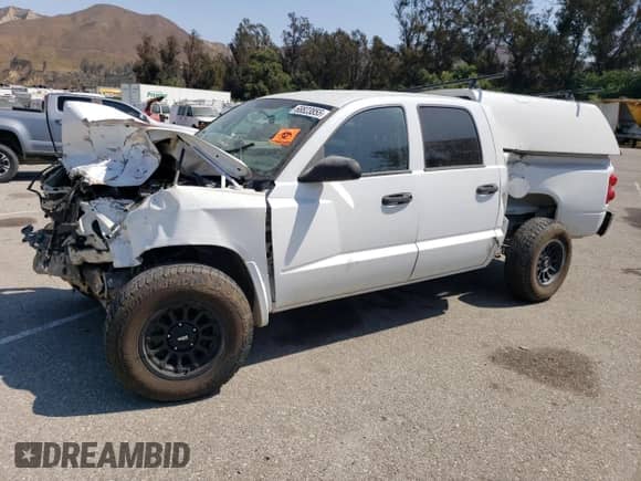 2007 Dodge Dakota ST z VIN 1D7HE28K37S227337, wystawiony jako Copart lot #68823855 z przebiegiem Nie podano mil oraz Szkoda całkowita • Salvage title. Historia ofert i sprzedaży dostępna na DreamBid. Obrazek 1.