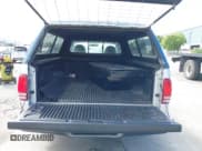 ✅ 2002 Dodge Dakota • VIN: 1B7FL16X62S537717 • Lot: 42261629. Wystawiony na IAAI z przebiegiem Nie podano. Bezpłatny archiwum sprzedaży aukcyjnych z USA i szczegółowy raport historii pojazdu na DreamBid. Zdjęcie 8.