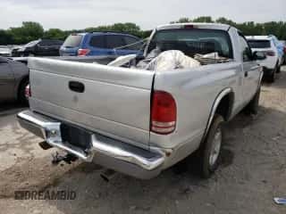 2001 Dodge Dakota с VIN 1B7GG26X01S194089, выставлен на аукционе Copart как лот 51527132 с пробегом 198 011 миль миль и Списание • Salvage title. История ставок и продаж доступна на DreamBid. Изображение 4.