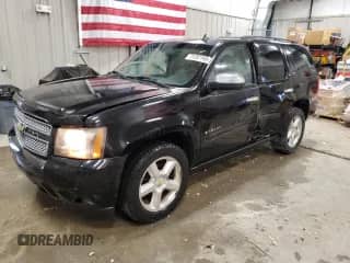 2008 Chevrolet Tahoe LTZ z VIN 1GNFK13038J157413, wystawiony jako Copart lot #71207145 z przebiegiem 165 813 mil mil oraz Czysty tytuł • Clean title. Historia ofert i sprzedaży dostępna na DreamBid. Obrazek 1.
