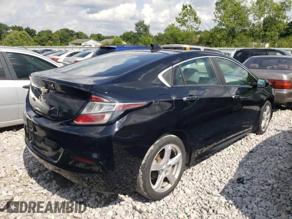 2016 Chevrolet Volt LT z VIN 1G1RA6S59GU101663, wystawiony jako Copart lot #59915713 z przebiegiem 128 084 mil mil oraz . Historia ofert i sprzedaży dostępna na DreamBid. Obrazek 3.