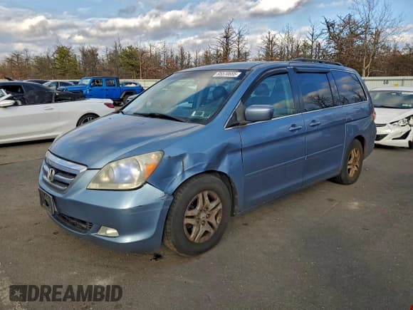 ✅ 2006 Honda Odyssey EX-L • VIN: 5FNRL38776B070297 • Лот: 95570655. Опубликован ранее на Copart с пробегом 124 763 миль. Бесплатный доступ к архиву аукционных продаж из США и подробный отчёт об истории автомобиля на DreamBid. Изображение 1.