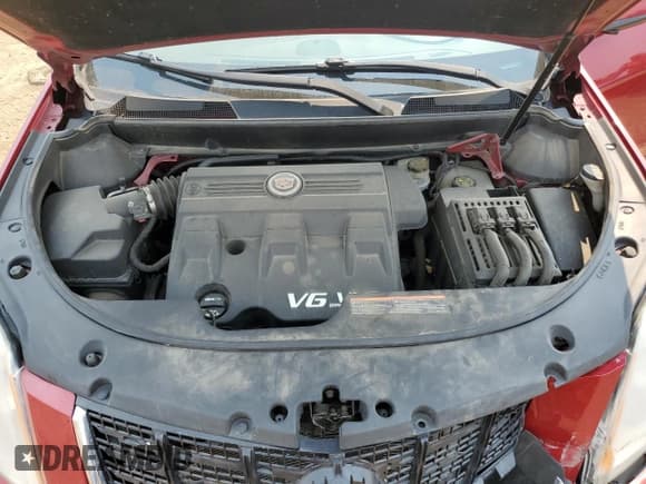 ✅ 2015 Cadillac SRX Performance Collection • VIN: 3GYFNFE33FS575254 • Lot: 67310025. Wystawiony na Copart z przebiegiem 67 839 mil. Bezpłatny archiwum sprzedaży aukcyjnych z USA i szczegółowy raport historii pojazdu na DreamBid. Zdjęcie 12.