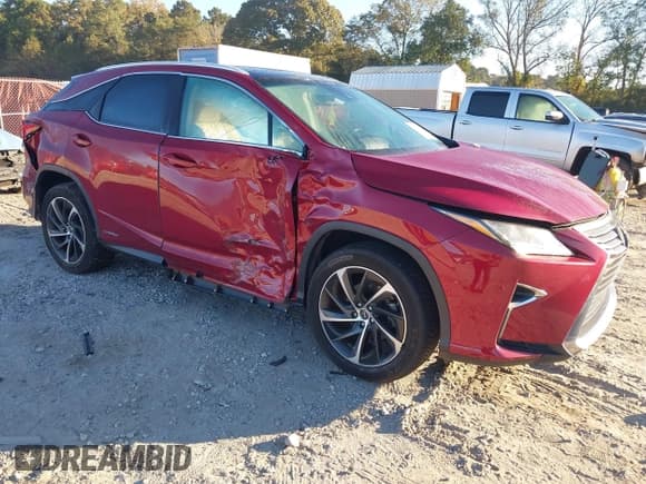 ✅ 2018 Lexus RX 450h • VIN: 2T2BGMCA4JC022764 • Lot: 43441583. Listed on IAAI with 125,917 mi. Free auction sales archive from the USA and detailed vehicle history report at DreamBid. Image 1.