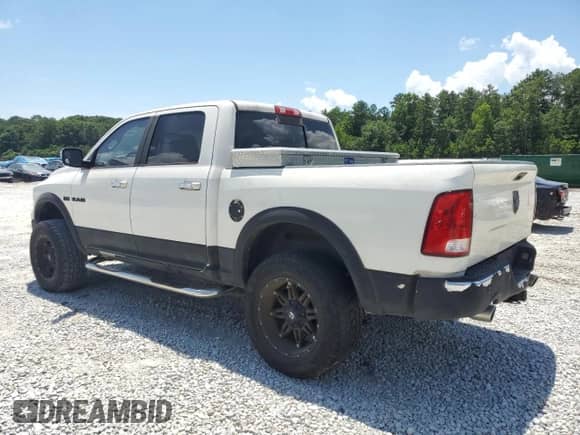 2009 Dodge 1500 Laramie с VIN 1D3HB13TX9S730662, выставлен на аукционе Copart как лот 65035075 с пробегом 164 178 миль миль и Чистый • Clean title. История ставок и продаж доступна на DreamBid. Изображение 2.