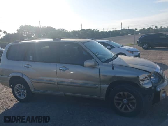 ✅ 2006 Suzuki XL7 • VIN: JS3TY92V064101982 • Lot: 41284585. Listed on IAAI with 237,353 mi. Free auction sales archive from the USA and detailed vehicle history report at DreamBid. Image 13.