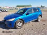 ✅ 2013 Mazda CX-5 Touring • VIN: JM3KE4CE8D0102801 • Lot: 43206563. Listed on IAAI with 149,282 mi. Free auction sales archive from the USA and detailed vehicle history report at DreamBid. Image 17.