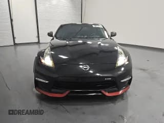 ✅ 2015 Nissan 370Z Nismo • VIN: JN1AZ4EH7FM442018 • Lot: 91303665. Wystawiony na Copart z przebiegiem 104 867 mil. Bezpłatny archiwum sprzedaży aukcyjnych z USA i szczegółowy raport historii pojazdu na DreamBid. Zdjęcie 5.