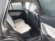 ✅ 2016 Mazda CX-5 Grand Touring • VIN: JM3KE4DY2G0763608 • Lot: 43864275. Wystawiony na IAAI z przebiegiem 95 452 mil. Bezpłatny archiwum sprzedaży aukcyjnych z USA i szczegółowy raport historii pojazdu na DreamBid. Zdjęcie 8.