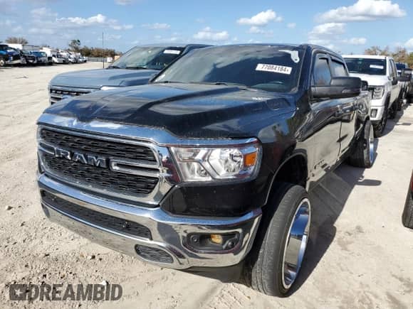2023 Ram 1500 Lone Star with VIN 1C6RREMT8PN565793, listed as a Copart auction lot 77084184 with 18,825 mi miles and Salvage title. Bid and sale history available at DreamBid. Image 1.