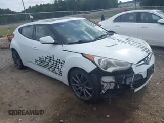 ✅ 2013 Hyundai Veloster w/Gray Int • VIN: KMHTC6AD3DU131703 • Lot: 42468831. Wystawiony na IAAI z przebiegiem 188 513 mil. Bezpłatny archiwum sprzedaży aukcyjnych z USA i szczegółowy raport historii pojazdu na DreamBid. Zdjęcie 1.