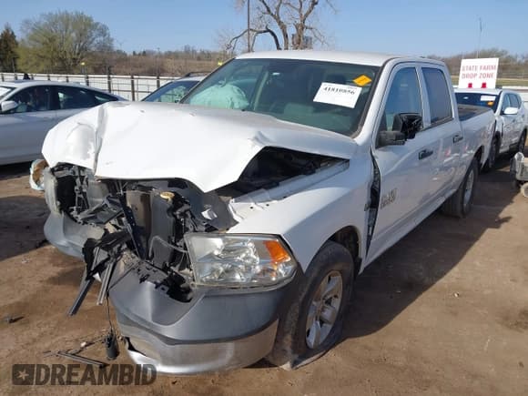 ✅ 2018 Ram 1500 Tradesman • VIN: 1C6RR6STXJS280045 • Lot: 41810856. Listed on IAAI with 111,797 mi. Free auction sales archive from the USA and detailed vehicle history report at DreamBid. Image 2.