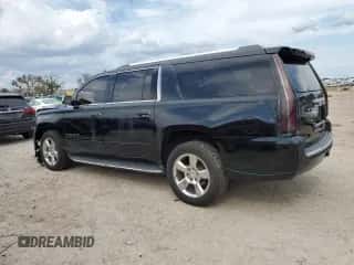 2017 Chevrolet Suburban Premier z VIN 1GNSCJKC2HR115257, wystawiony jako Copart lot #70398544 z przebiegiem 110 577 mil mil oraz Szkoda całkowita • Salvage title. Historia ofert i sprzedaży dostępna na DreamBid. Obrazek 2.