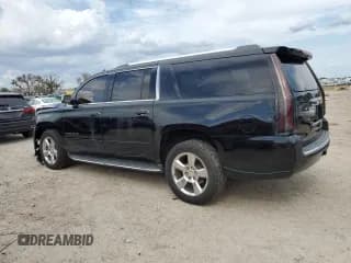✅ 2017 Chevrolet Suburban Premier • VIN: 1GNSCJKC2HR115257 • Lot: 70398544. Wystawiony na Copart z przebiegiem 110 577 mil. Bezpłatny archiwum sprzedaży aukcyjnych z USA i szczegółowy raport historii pojazdu na DreamBid. Zdjęcie 2.