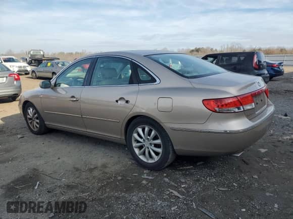 2006 Hyundai Azera SE с VIN KMHFC46F56A039489, выставлен на аукционе Copart как лот 86873074 с пробегом 88 264 миль миль и Чистый • Clean title. История ставок и продаж доступна на DreamBid. Изображение 2.