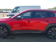 ✅ 2025 Mazda CX-50 S Premium Plus • VIN: 7MMVABEMXSN373157 • Лот: 43327615. Опубликован ранее на IAAI с пробегом 6 129 миль. Бесплатный доступ к архиву аукционных продаж из США и подробный отчёт об истории автомобиля на DreamBid. Изображение 14.