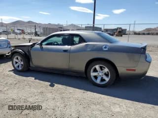 ✅ 2012 Dodge Challenger SXT • VIN: 2C3CDYAG2CH268340 • Lot: 68305604. Wystawiony na Copart z przebiegiem 183 818 mil. Bezpłatny archiwum sprzedaży aukcyjnych z USA i szczegółowy raport historii pojazdu na DreamBid. Zdjęcie 2.