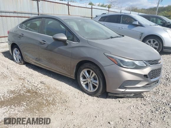 ✅ 2017 Chevrolet Cruze LT • VIN: 1G1BE5SM7H7175896 • Lot: 43538085. Listed on IAAI with 77,730 mi. Free auction sales archive from the USA and detailed vehicle history report at DreamBid. Image 1.