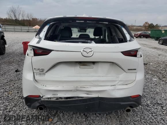 ✅ 2023 Mazda CX-5 S Preferred • VIN: JM3KFBCM8P0193033 • Lot: 93242425. Listed on Copart with 67,206 mi. Free auction sales archive from the USA and detailed vehicle history report at DreamBid. Image 6.