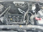 ✅ 2010 Ford Escape Limited • VIN: 1FMCU0E74AKA03606 • Lot: 42491206. Listed on IAAI with 106,749 mi. Free auction sales archive from the USA and detailed vehicle history report at DreamBid. Image 13.