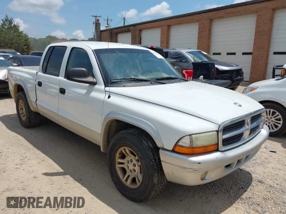 ✅ 2003 Dodge Dakota SLT • VIN: 1D7HL48X63S144573 • Lot: 42798150. Wystawiony na IAAI z przebiegiem 224 361 mil. Bezpłatny archiwum sprzedaży aukcyjnych z USA i szczegółowy raport historii pojazdu na DreamBid. Zdjęcie 1.