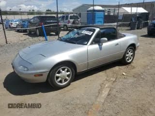 ✅ 1990 Mazda MX-5 Miata • VIN: JM1NA3517L0137706 • Lot: 63731695. Listed on Copart with 138,902 mi. Free auction sales archive from the USA and detailed vehicle history report at DreamBid. Image 1.