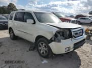 ✅ 2011 Honda Pilot Touring • VIN: 5FNYF3H94BB052287 • Lot: 87191145. Listed on Copart with 195,954 mi. Free auction sales archive from the USA and detailed vehicle history report at DreamBid. Image 4.