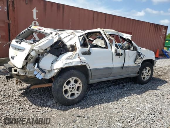 ✅ 2000 Jeep Grand Cherokee Laredo • VIN: 1J4G248S1YC329509 • Лот: 58589373. Опубликован ранее на Copart с пробегом Не указан. Бесплатный доступ к архиву аукционных продаж из США и подробный отчёт об истории автомобиля на DreamBid. Изображение 3.