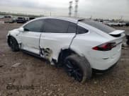 ✅ 2018 Tesla Model X 75D • VIN: 5YJXCDE44JF109492 • Lot: 69084543. Listed on Copart with 52,025 mi. Free auction sales archive from the USA and detailed vehicle history report at DreamBid. Image 2.