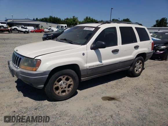 ✅ 2001 Jeep Grand Cherokee Laredo • VIN: 1J4GW48N21C505942 • Lot: 60498825. Listed on Copart with 258,115 mi. Free auction sales archive from the USA and detailed vehicle history report at DreamBid. Image 1.