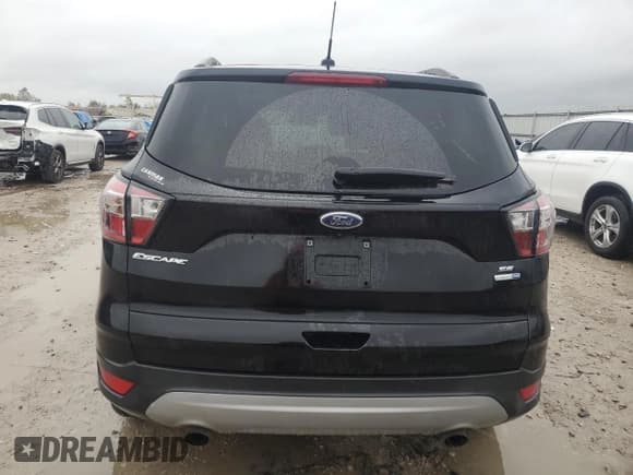 ✅ 2017 Ford Escape SE • VIN: 1FMCU9GD2HUD58053 • Lot: 85957545. Listed on Copart with 70,159 mi. Free auction sales archive from the USA and detailed vehicle history report at DreamBid. Image 6.