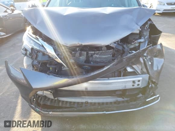 ✅ 2022 Toyota Sienna XLE • VIN: 5TDJRKEC2NS097036 • Lot: 43599966. Listed on IAAI with 47,765 mi. Free auction sales archive from the USA and detailed vehicle history report at DreamBid. Image 6.