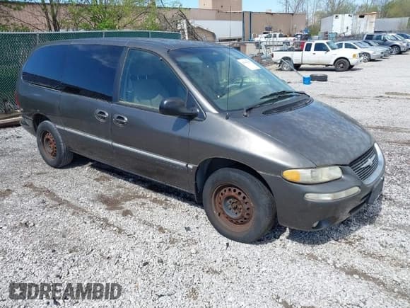 ✅ 1999 Chrysler Town & Country LX • VIN: 1C4GP54LXXB553393 • Lot: 41968605. Listed on IAAI with 256,400 mi. Free auction sales archive from the USA and detailed vehicle history report at DreamBid. Image 1.