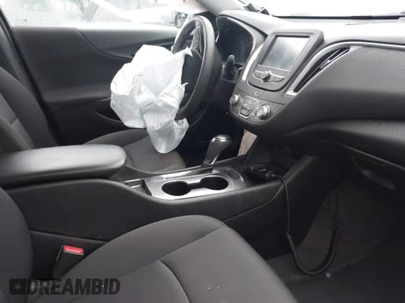 2018 Chevrolet Malibu LS z VIN 1G1ZC5ST3JF161064, wystawiony jako IAAI lot #42008987 z przebiegiem 72 911 mil mil oraz . Historia ofert i sprzedaży dostępna na DreamBid. Obrazek 5.