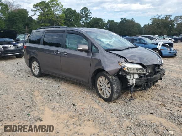 ✅ 2015 Toyota Sienna Limited • VIN: 5TDDK3DC5FS127866 • Lot: 71117475. Listed on Copart with 119,211 mi. Free auction sales archive from the USA and detailed vehicle history report at DreamBid. Image 4.
