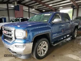 ✅ 2018 GMC Sierra 1500 SLT • VIN: 3GTU2NEC7JG551163 • Lot: 71479025. Listed on Copart with 128,577 mi. Free auction sales archive from the USA and detailed vehicle history report at DreamBid. Image 1.