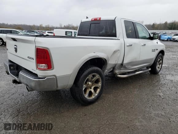 ✅ 2014 Ram 1500 Laramie • VIN: 1C6RR7JT5ES203175 • Лот: 90681655. Опубликован ранее на Copart с пробегом 192 741 миль. Бесплатный доступ к архиву аукционных продаж из США и подробный отчёт об истории автомобиля на DreamBid. Изображение 3.
