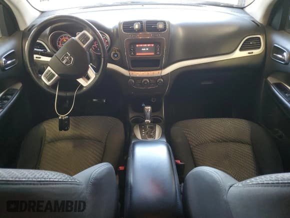 ✅ 2018 Dodge Journey SXT • VIN: 3C4PDDBG2JT159479 • Lot: 85004295. Listed on Copart with 104,654 mi. Free auction sales archive from the USA and detailed vehicle history report at DreamBid. Image 8.