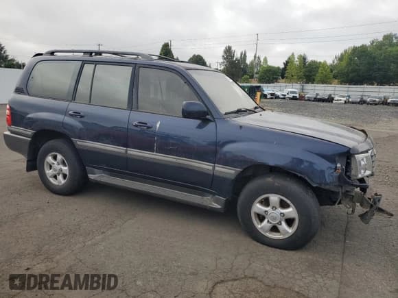✅ 2000 Toyota Land Cruiser • VIN: JT3HT05J0Y0082257 • Lot: 63392145. Listed on Copart with 355,619 mi. Free auction sales archive from the USA and detailed vehicle history report at DreamBid. Image 4.