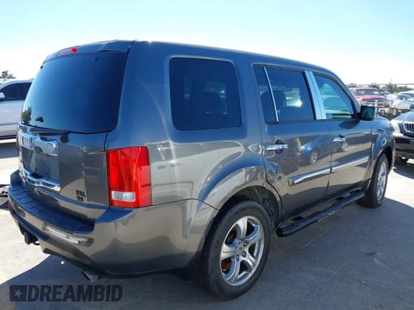 ✅ 2012 Honda Pilot EX-L • VIN: 5FNYF3H62CB022552 • Lot: 43556702. Listed on IAAI with 213,233 mi. Free auction sales archive from the USA and detailed vehicle history report at DreamBid. Image 4.