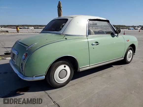 ✅ 1991 Nissan Figaro • VIN: FK10016600 • Lot: 78201154. Listed on Copart with 124,678 mi. Free auction sales archive from the USA and detailed vehicle history report at DreamBid. Image 3.