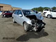 ✅ 2009 Kia Spectra LX • VIN: KNAFE221295605504 • Lot: 92089535. Listed on Copart with 150,112 mi. Free auction sales archive from the USA and detailed vehicle history report at DreamBid. Image 13.