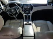 ✅ 2014 Cadillac SRX Performance Collection • VIN: 3GYFNCE36ES517992 • Лот: 80317845. Опубликован ранее на Copart с пробегом 98 735 миль. Бесплатный доступ к архиву аукционных продаж из США и подробный отчёт об истории автомобиля на DreamBid. Изображение 8.