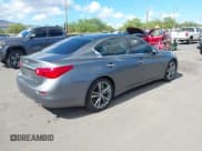 ✅ 2014 Infiniti Q50 Premium • VIN: JN1BV7AP4EM684004 • Lot: 42991503. Listed on IAAI with 166,575 mi. Free auction sales archive from the USA and detailed vehicle history report at DreamBid. Image 4.