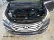 2018 Hyundai Santa Fe 2.4L z VIN 5XYZU3LB7JG543240, wystawiony jako Copart lot #89693095 z przebiegiem 121 636 mil mil oraz Czysty tytuł • Clean title. Historia ofert i sprzedaży dostępna na DreamBid. Obrazek 12.