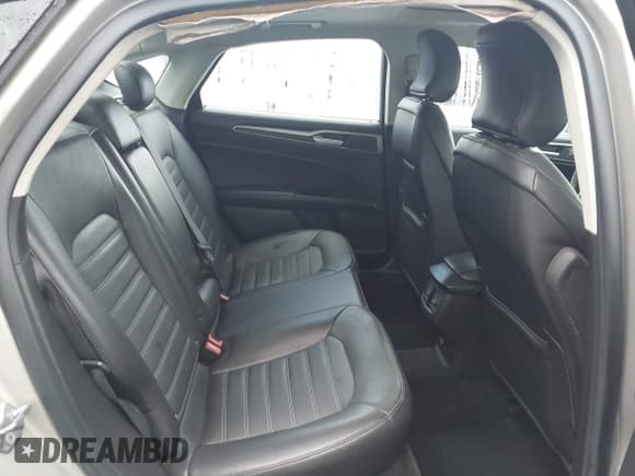 ✅ 2015 Ford Fusion SE Hybrid • VIN: 3FA6P0LU4FR199170 • Лот: 43693803. Опубликован ранее на IAAI с пробегом 180 099 миль. Бесплатный доступ к архиву аукционных продаж из США и подробный отчёт об истории автомобиля на DreamBid. Изображение 8.