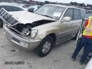 ✅ 2000 Lexus LX 470 • VIN: JT6HT00W7Y0105216 • Lot: 42187039. Wystawiony na IAAI z przebiegiem 191 627 mil. Bezpłatny archiwum sprzedaży aukcyjnych z USA i szczegółowy raport historii pojazdu na DreamBid. Zdjęcie 2.